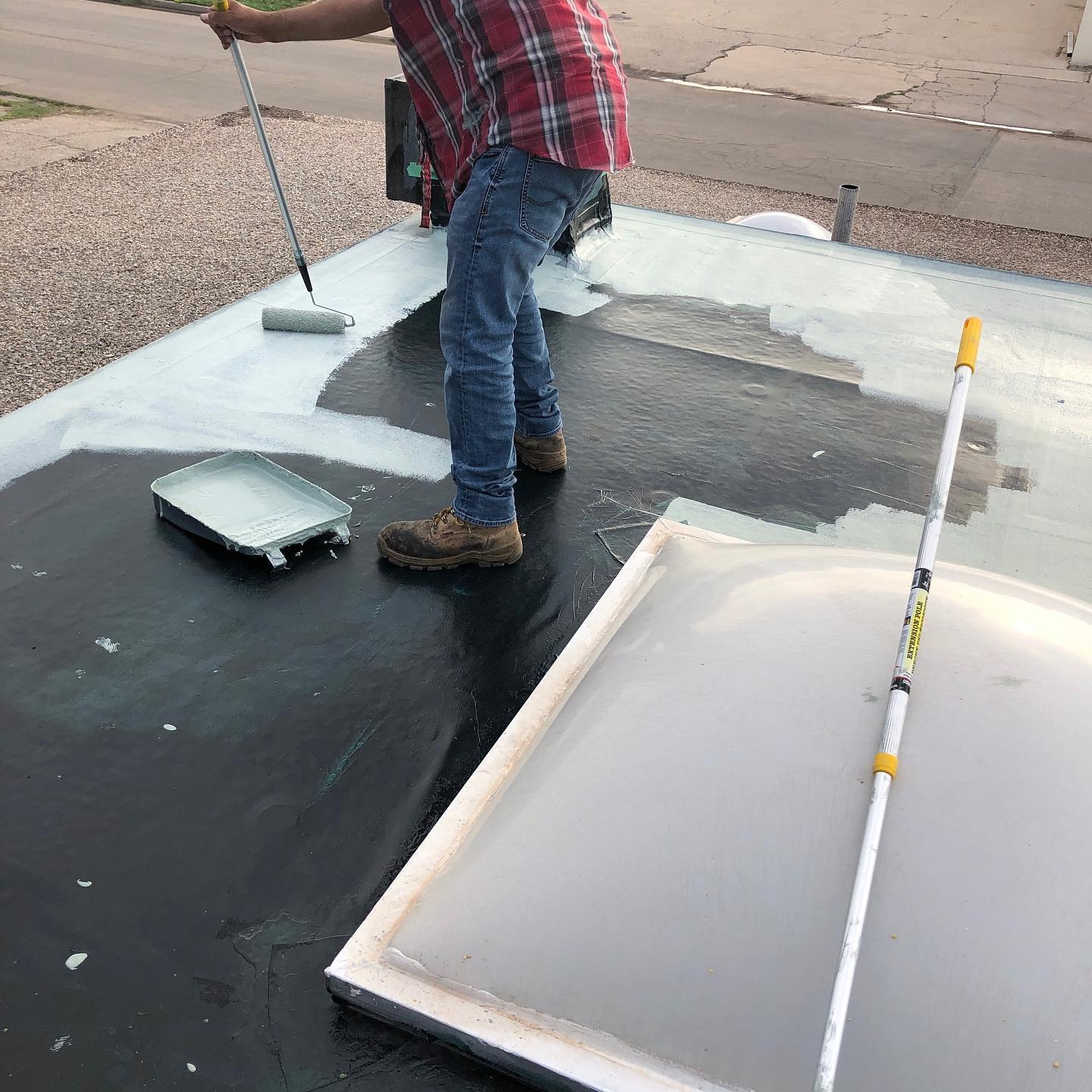 Worker Doing Roof Coating